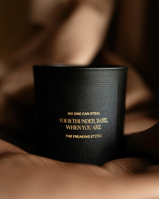 The Empowering Candle by Muse Feminist – a luxury coconut wax candle with Black Truffle, Ylang Ylang, and Blackcurrant. Perfect for relaxation and self-care
