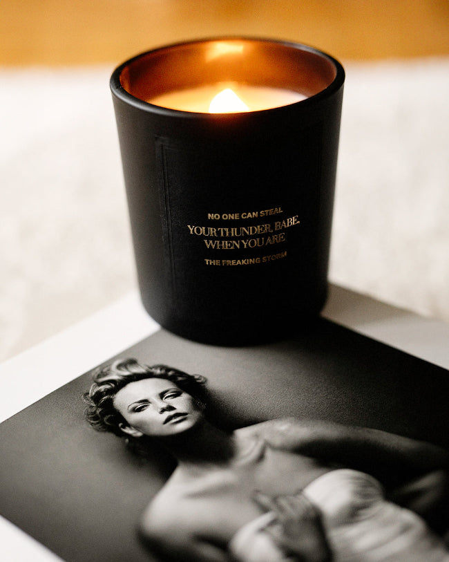 Muse Feminist Empowering Candle - Black Truffle, Ylang Ylang, and Blackcurrant scent. Inscribed with empowering slogan 'No one can steal your thunder, babe, when you are the freaking storm".